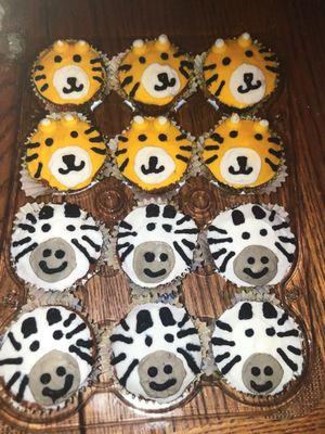 Lions, tigers, and bears oh my, well just tigers and zebra cupcakes