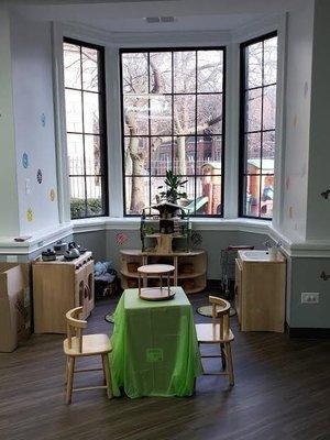 The center is full of bright spaces. This windowed alcove is perfect for dramatic play.