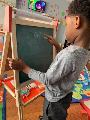 Learning how to write his name