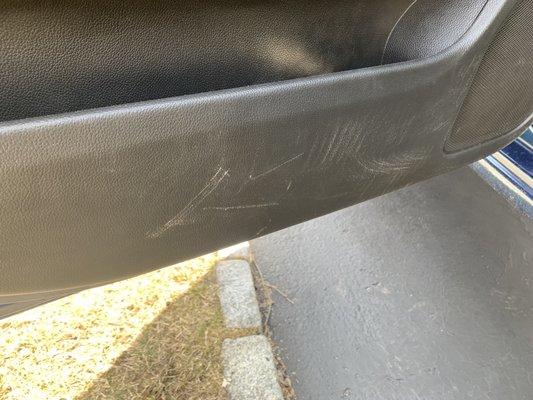 Scratches on door panel that were not there when it was dropped off