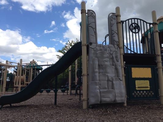 Rock climbing wall and slide.