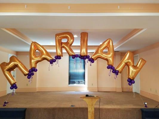 Letter balloon arch