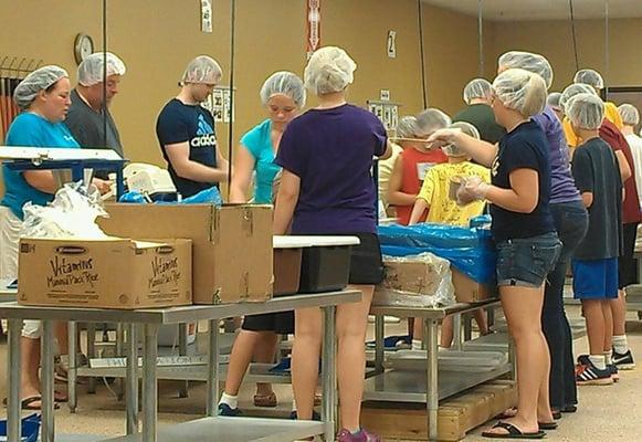 NorthBrook gets a group to volunteer at Feed My Starving Children periodically!