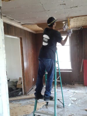 Removing damaged ceiling