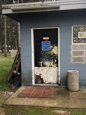 Men's restroom door.  Anyone else find the sign funny??