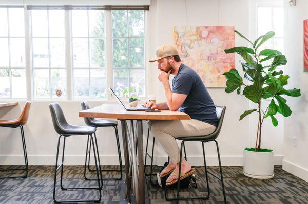 One of our friendly members coworking in our shared flexible area.