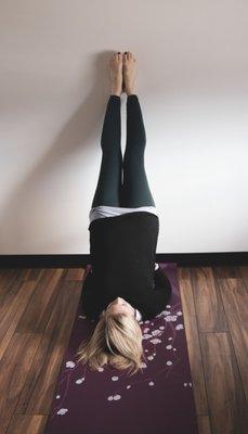 Wall assisted shoulder stand