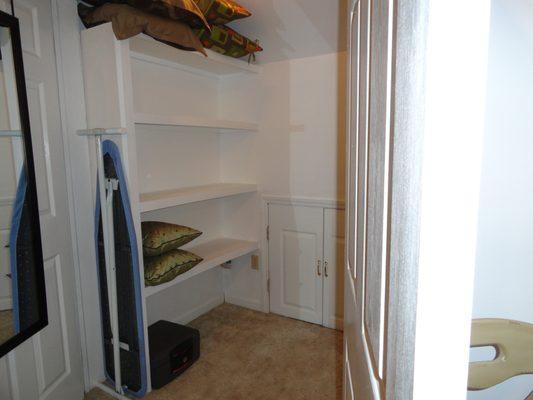 Large master closet with ironing board