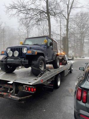 2003 Jeep Wrangler on the truck and off to Cottman Transmission in New Castle