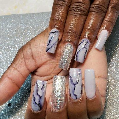 Fill in with marble gel polish art.