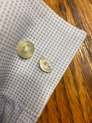 Example of damaged buttons. They have done that to at least five shirts.