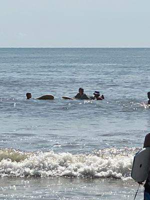 Nick teaching my boys how to surf