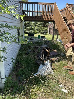 Before photo of yard cleanup