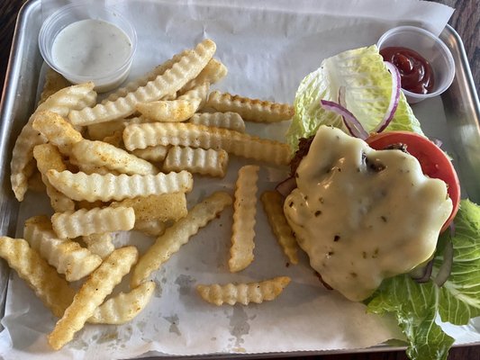 The Masterpiece Cheeseburger as a lettuce wrap with fries