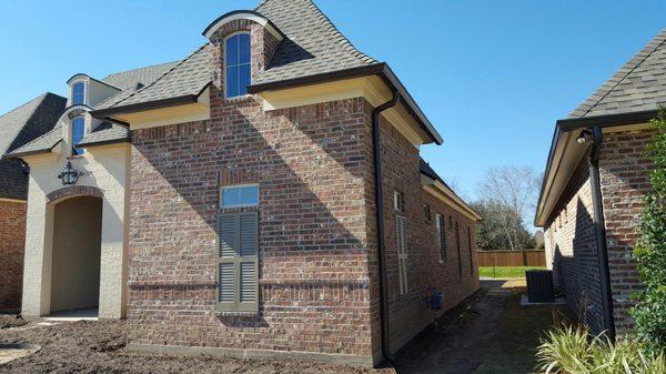 Six inch k-style gutters with four inch round downspouts