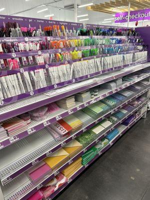 Pens, markers, and colorful paper goods like journals and notepads