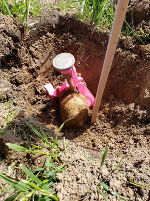 Sometimes a shovel is the best tool. Cap Bar found next to Monument Found!