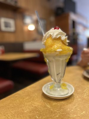 Pineapple sundae, peach and rum raisin (one scoop of each)