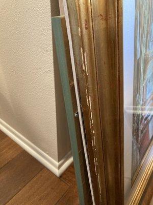 Damage to museum quality paining frame. Painting cost between $3K and $4K.