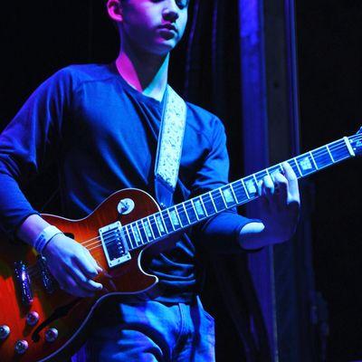 Ryan on stage with his semi hollow body Les Paul