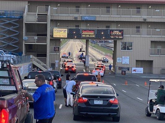 Cars waiting in line to race