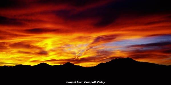 This is a view taken from Prescott Valley overlooking the mountains of Prescott. Fall and winter sunsets are the most beautif...