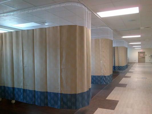 Recent Project: Custom made cubicle/privacy curtains with mesh using Diamond Drapery custom printed fabric.