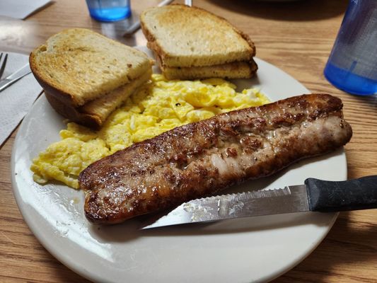 Sour dough toast, 2 scrambled, Italian sausage.