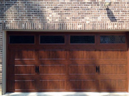 Steel Garage Door with Ultra Grain Wood Finish.