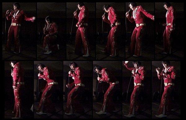 On stage in Los Angeles, wearing the 1972 'Burning Love' suit.  This was the only red jumpsuit that Elvis had.