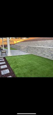 Retaining wall and turf with some pavers