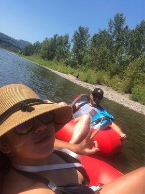 Two novice tubers enjoying the Clackamas River.