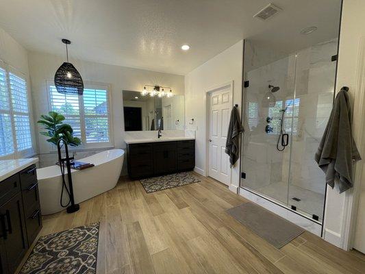 Frameless Shower and Mirrors to complete this stunning bathroom.