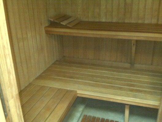 This cute little sauna is 43 years of seasoned love.  All natural cedar and steaming hot rocks!