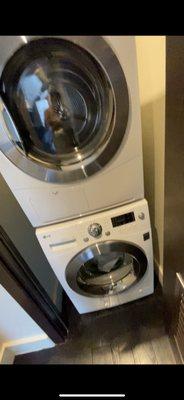 washer/dryer next to bedroom & bathroom of #1101