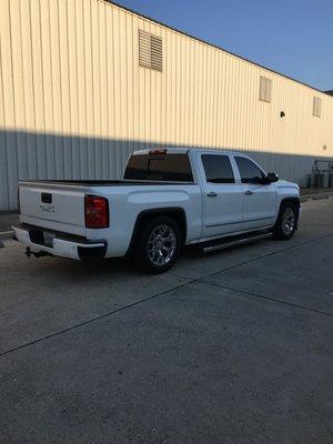 Chrome bumpers wrapped in gloss white vinyl.