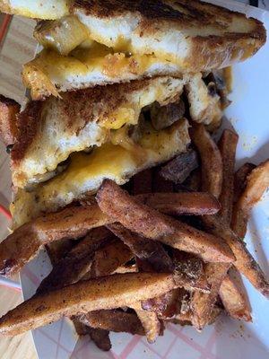 Daily special stroganoff grilled cheese with side of seasoned fries. Soooo good