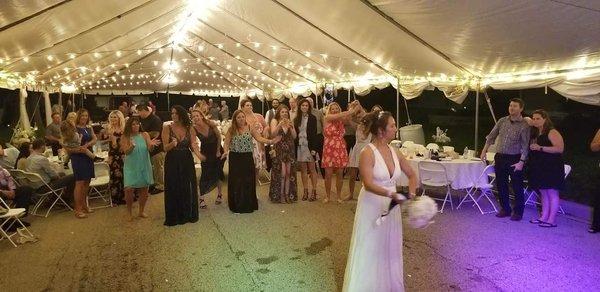 A beautiful wedding for a beautiful bride under one beautiful tent!  A magical evening and unforgettable event of a lifetime.