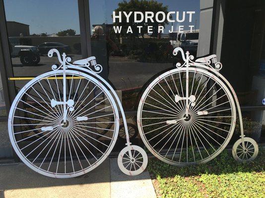 Cut on our waterjet as a display for a bicycle shop. Cut from aluminum Sheet.