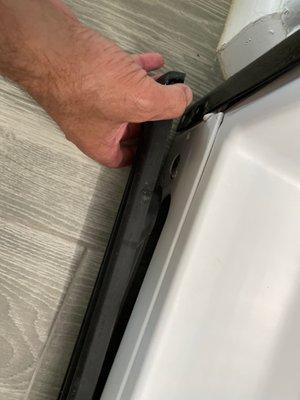 Bottom plastic to fridge