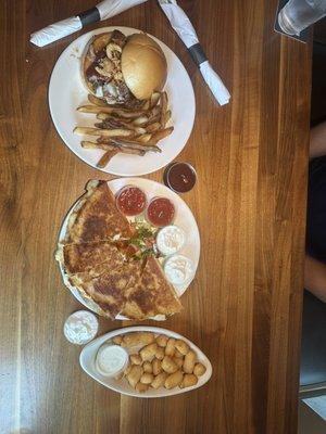 Chicken quesadilla, cheese curds and pulled pork sandwich with fries