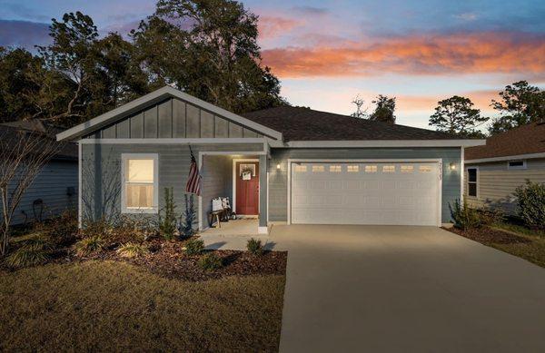 The twilight hues beautifully complement this stunning and nearly new resale home.