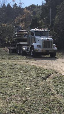 Equipment Transport truck and trailer.