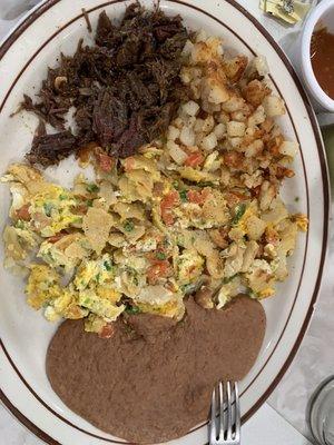 Migas with a side of barbacoa