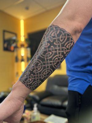 Celtic tribal band tattoo by Jon Poulson at Aloha Tattoos in Murray, UT