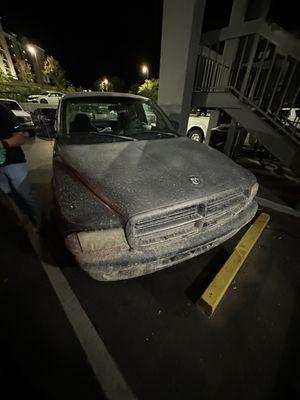 the truck that multiple people were standing on; right next to his truck RIGHT OUTSIDE of our unit.