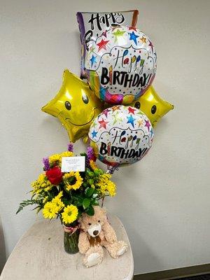 Birthday floral bouquet with balloons