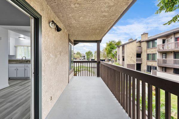 Large outdoor patio and balcony spaces.