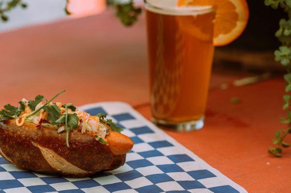 Grab a dog from Der Wurst Hot Dogs and a draft beer and enjoy our patio!