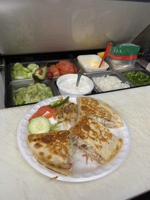 Chicken quesadilla 
Quesadilla de pollo